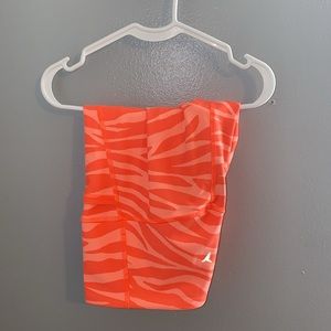 Coral zebra print biker shorts